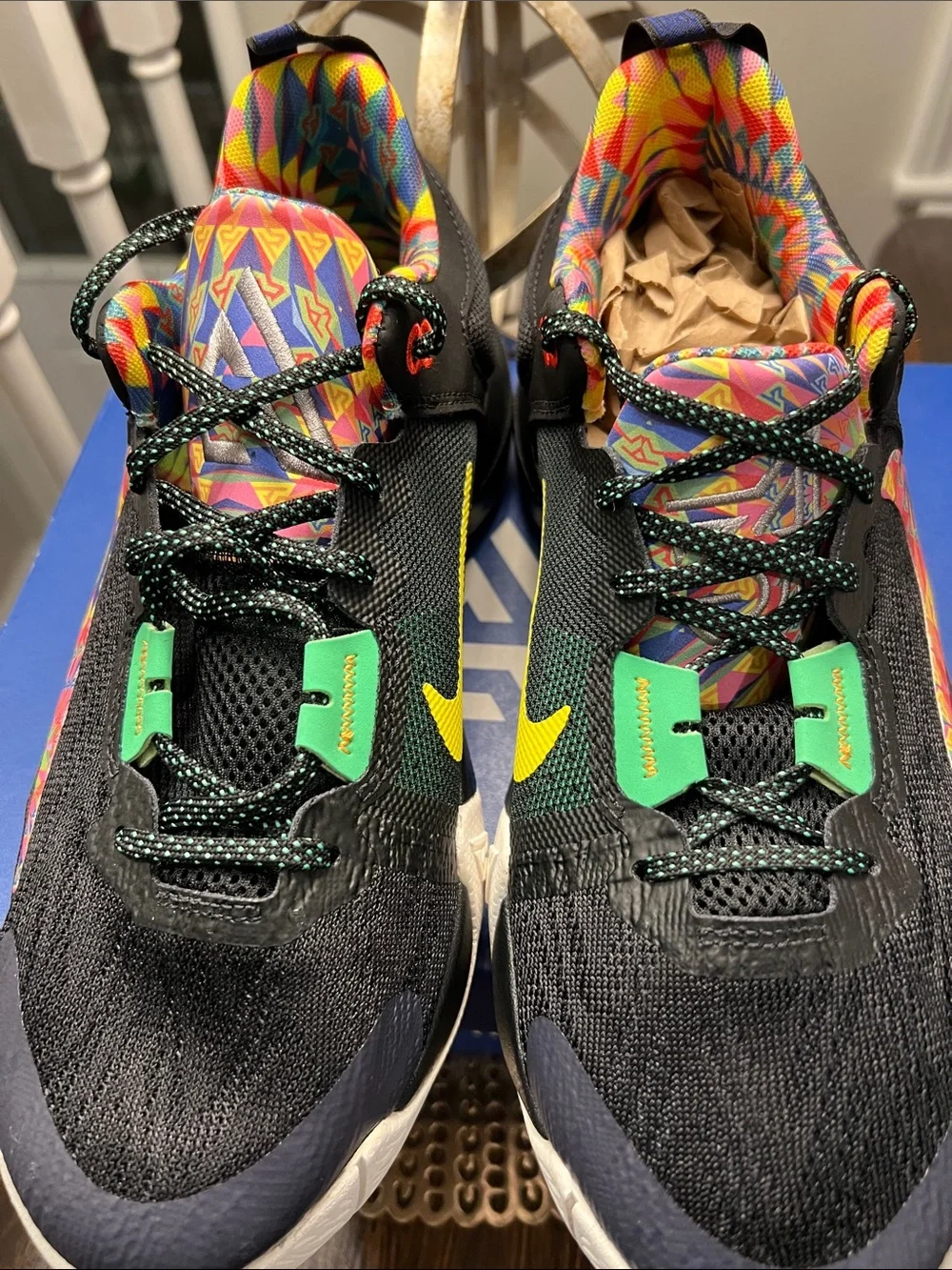 Nike Kids Black Sneakers with Yellow Accents and Multicolor Swoosh